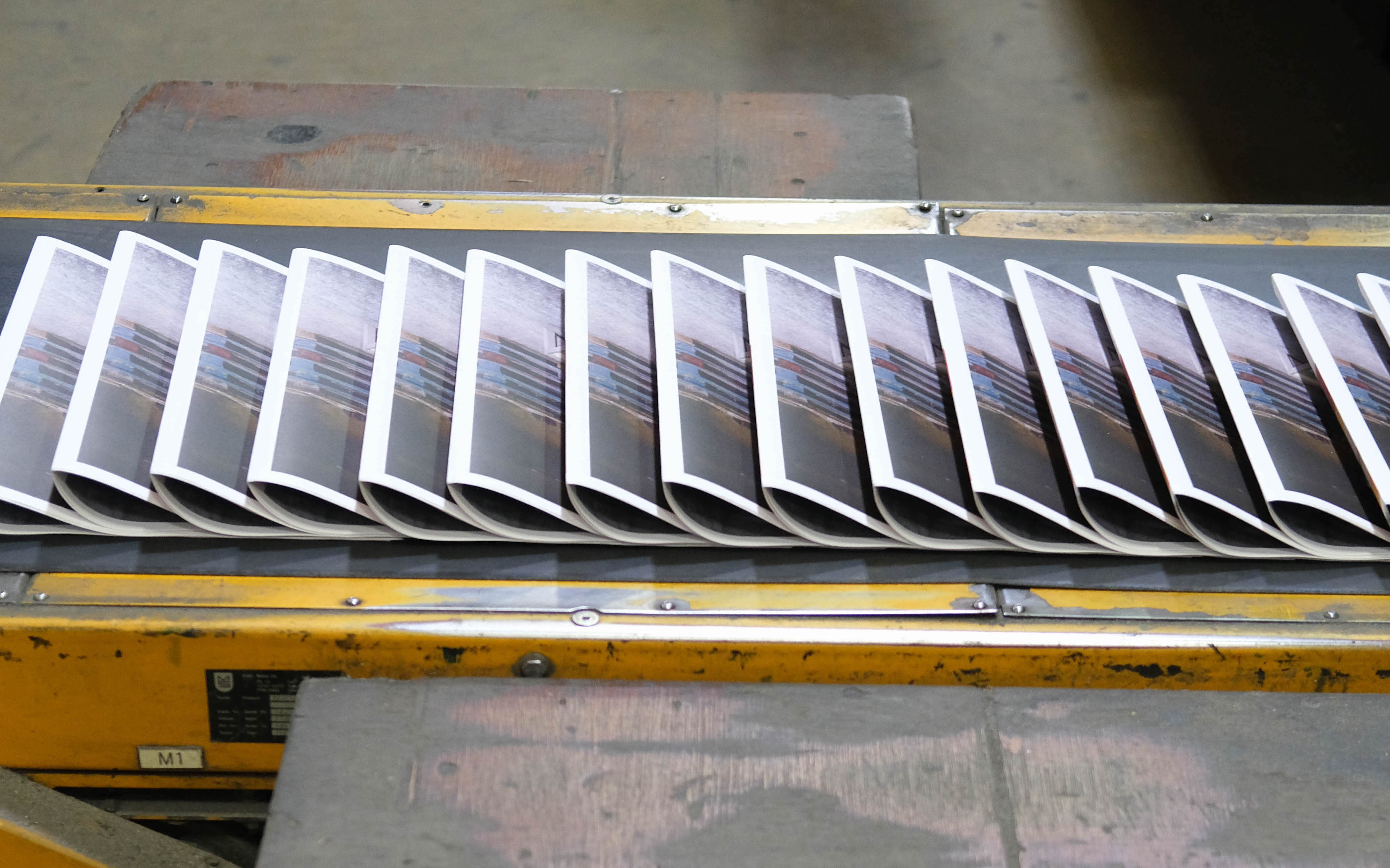 Traditional tabloid newspapers being printed at Newspaper Club.